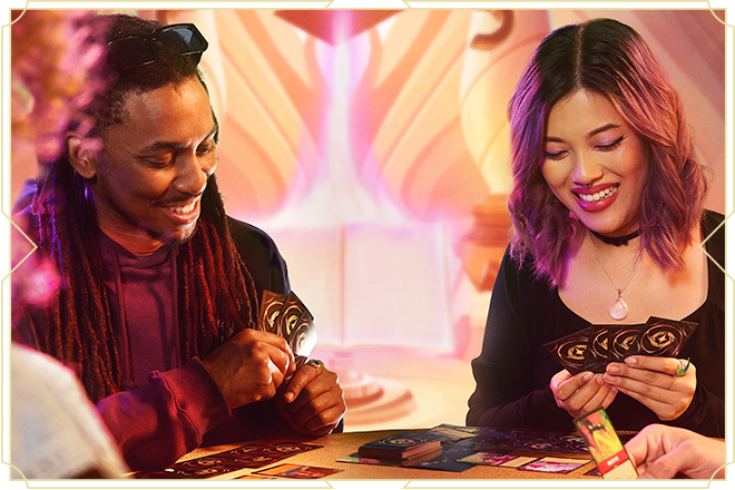 A small group of people having fun playing Disney Lorcana
