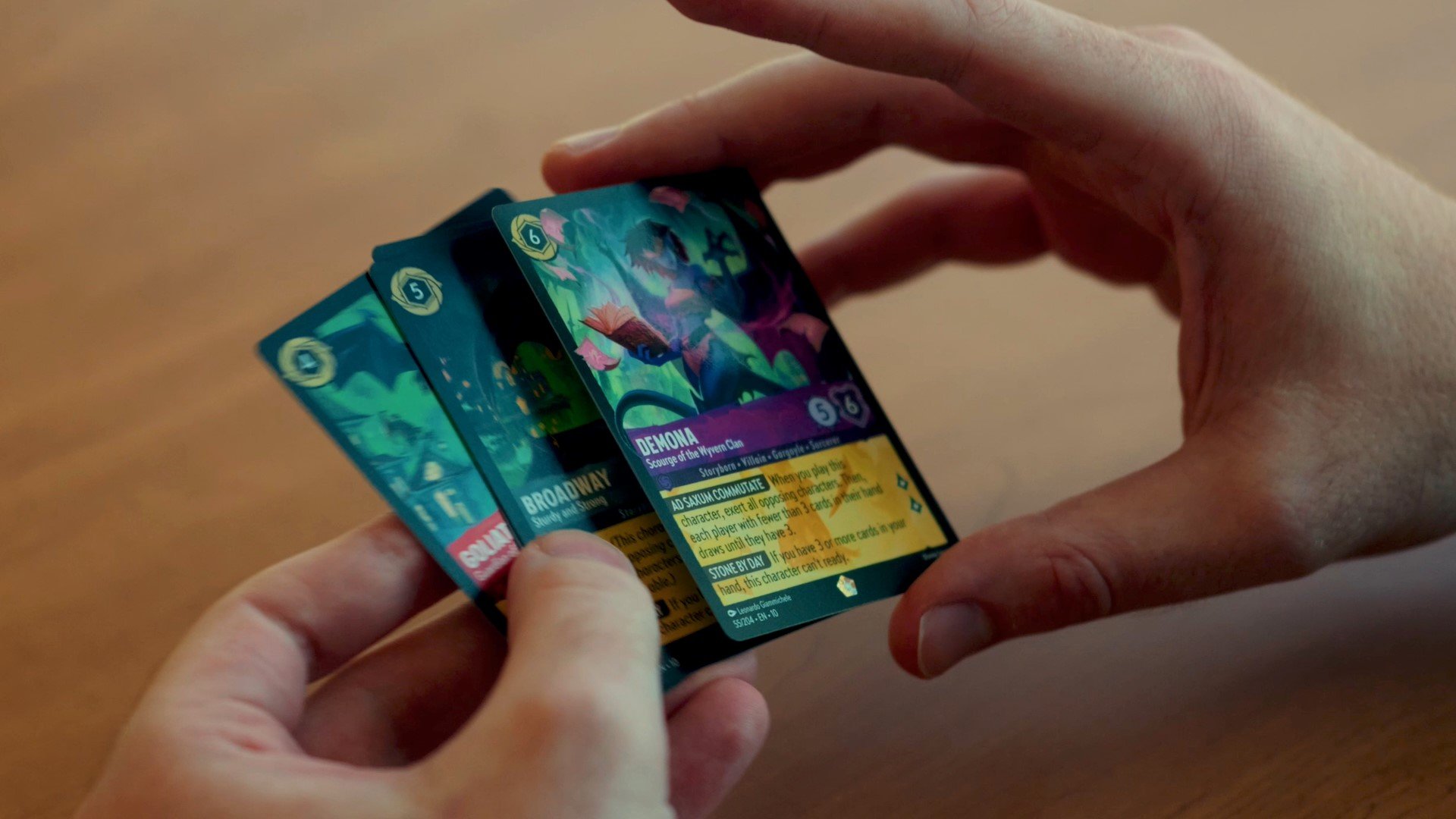 Disney Lorcana Demona Card with other Lorcana cards